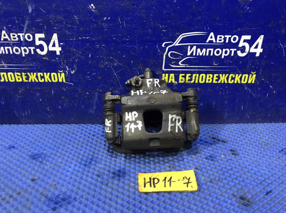 Суппорт тормозной передний правый NISSAN PRIMERA 1998