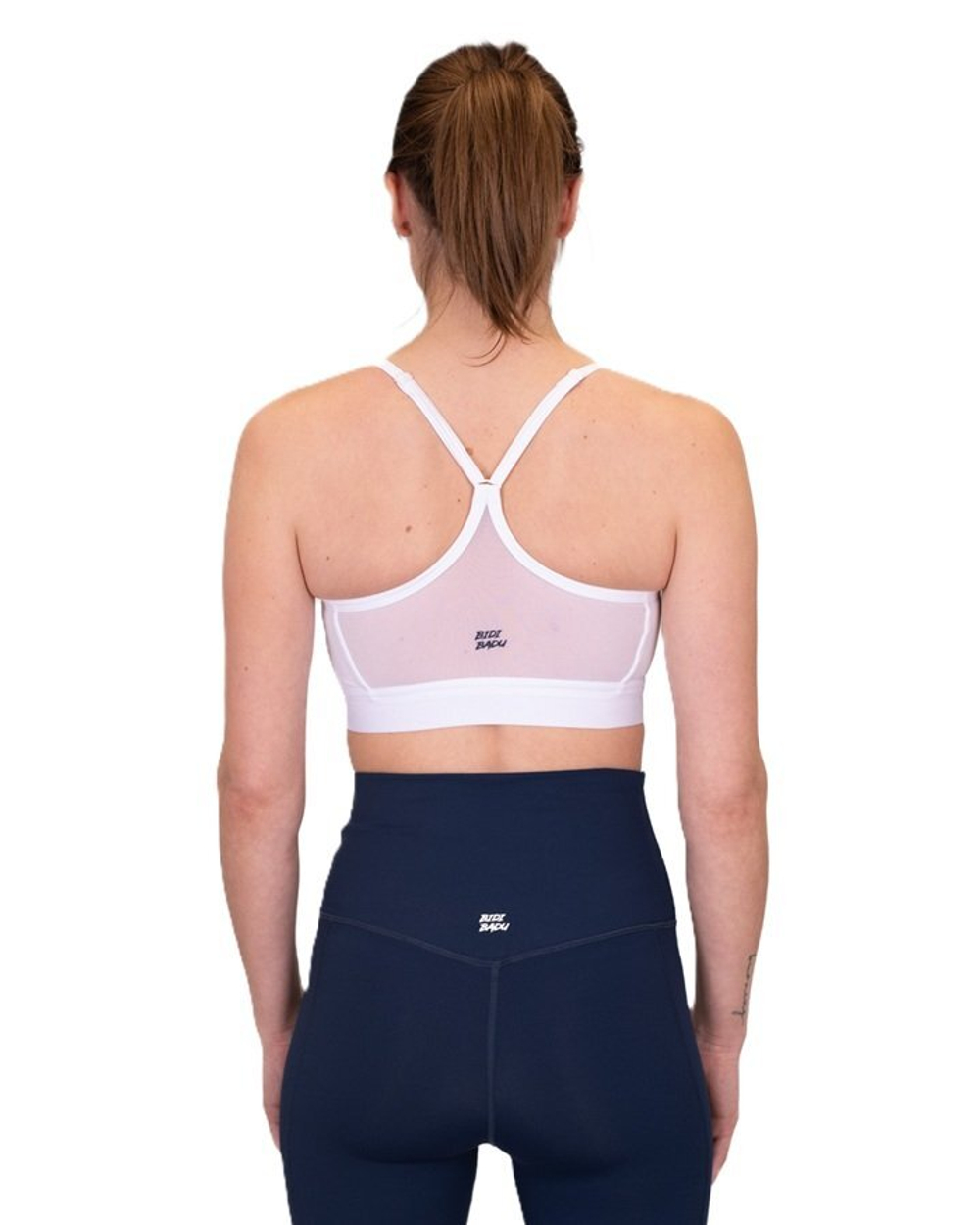 ОДЕЖДА ДЛЯ ТЕННИСА Женская, Спортивный бра BIDI BADU CREW LOW SUPPORT STRAPPY BRA .
