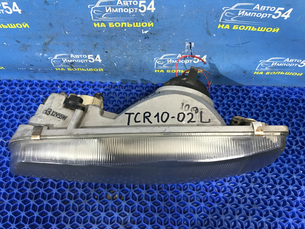 Фара передняя левая TOYOTA ESTIMA 1999