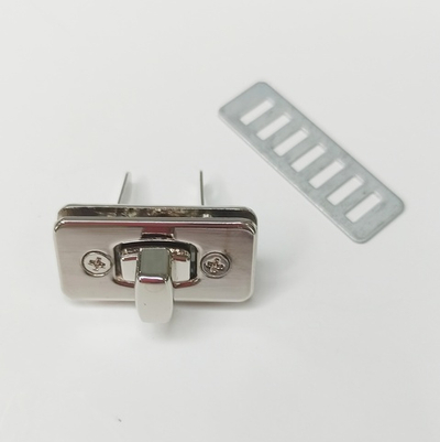 Замок вертушка на винтах 33*16 Серебро