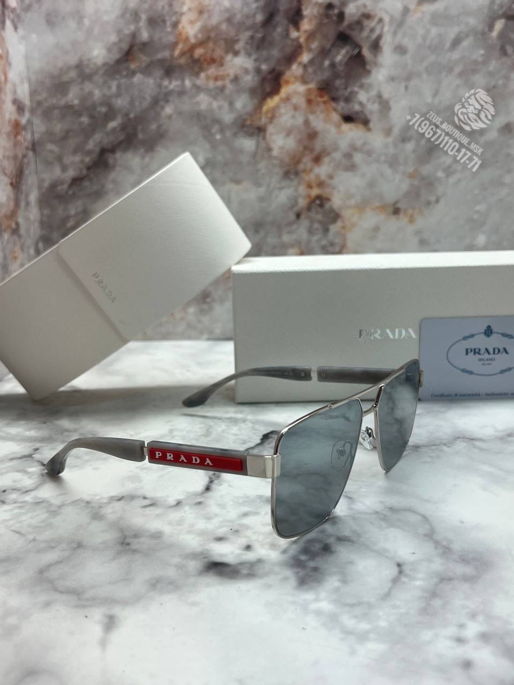 Солнечные очки Prada