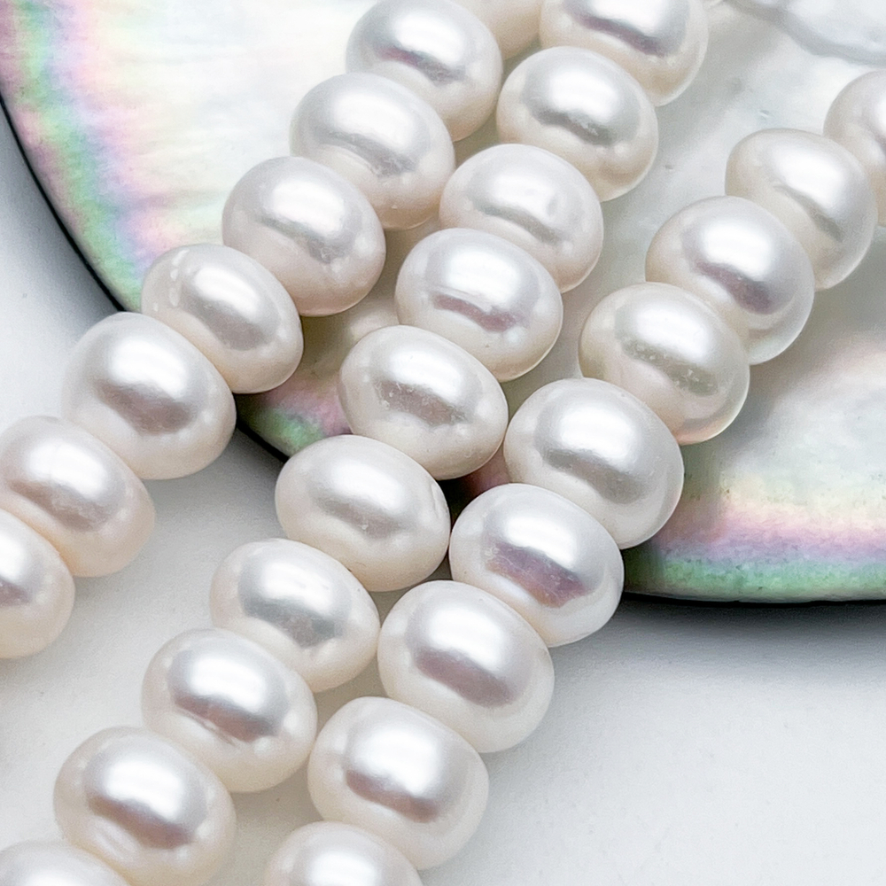 Жемчуг бусины, размер около 5,5-6,2*9,5-10,2 мм, цена за 13-14 шт (1/4 нити)