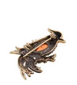 AM- 960 Брошь «Чибис» (латунь, янтарь)