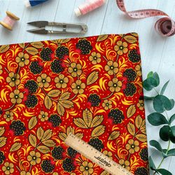Ткань дюспо хохлома с цветами и ягодами на красном ковре