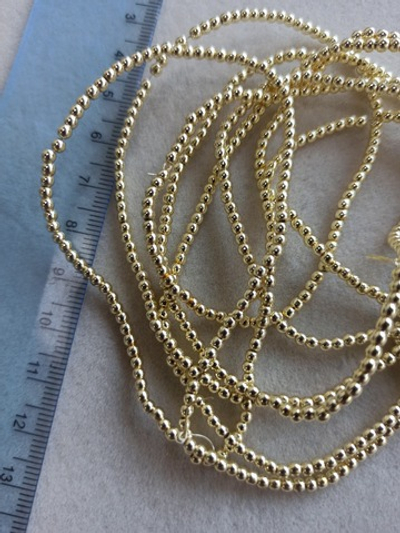 гшг2-з Гематит синт. люкс, шар гладкий 2мм, золото, 20см