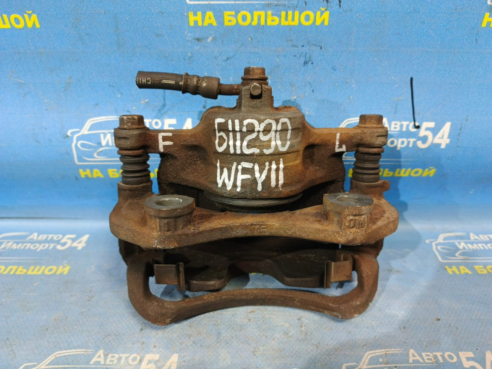 Суппорт тормозной передний левый NISSAN WINGROAD 1999-2005