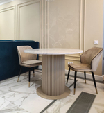 Круглый обеденный стол