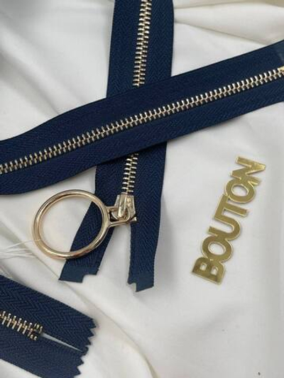 Молния темно-синяя с золотистым массивным кольцом