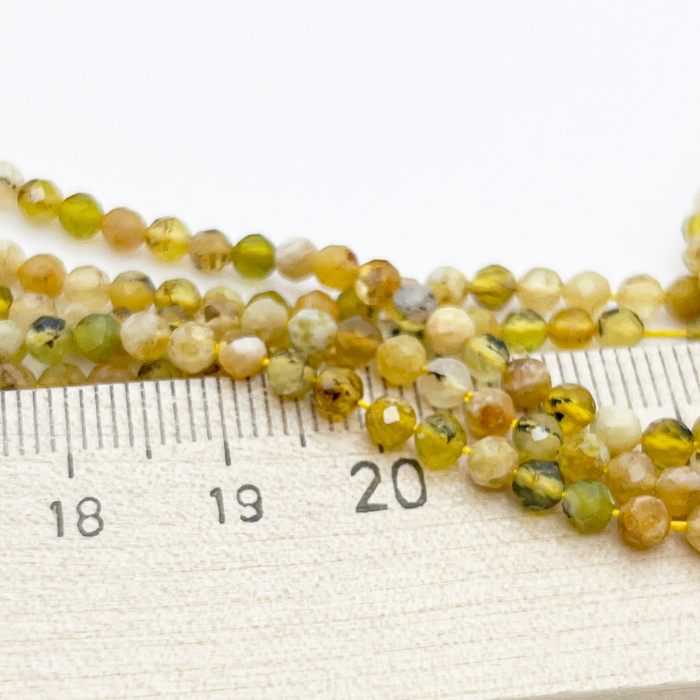 Опал желтый граненый, диаметр около 3,2-3,3 мм, цена за нить 120 шт (38 см)