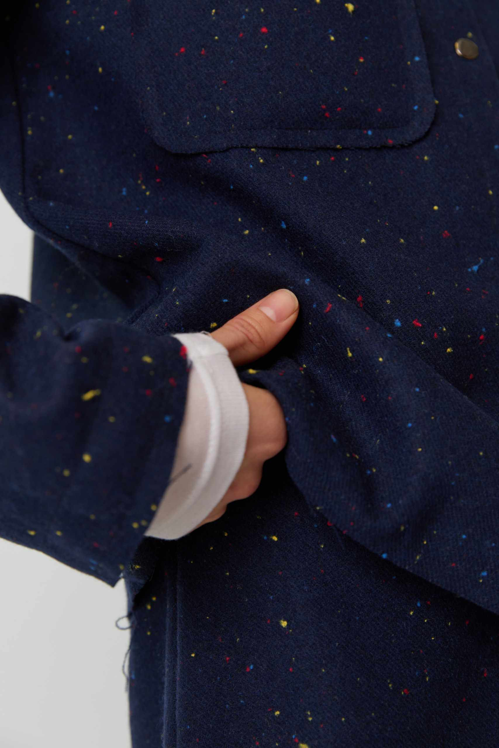 Жакет с карманом из синей шерсти с вкраплениями