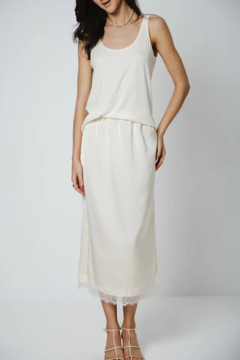 Юбка из шелка с кружевом миди кремовая