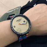 SWATCH Unisex 47mm Gold Watch