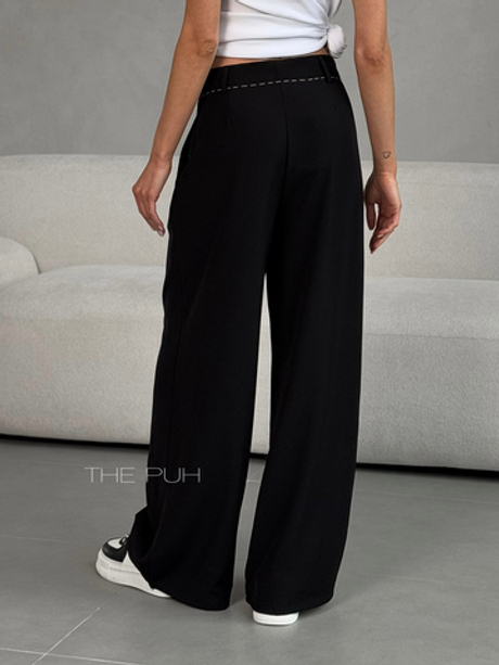 Женские брюки свободного кроя черного цвета