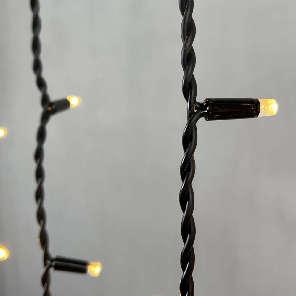 Светодиодная бахрома с колпачком 3,2*0,9 м., 168 теплых белых LED ламп, каучуковый черный провод, LTC (LL168-1-2WW)