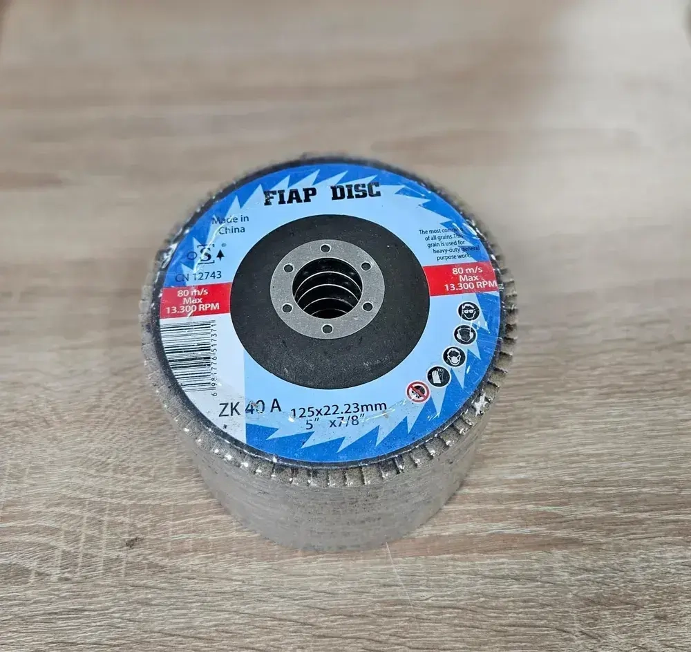 Круг лепестковый торцевой 125 x 22.23; P40