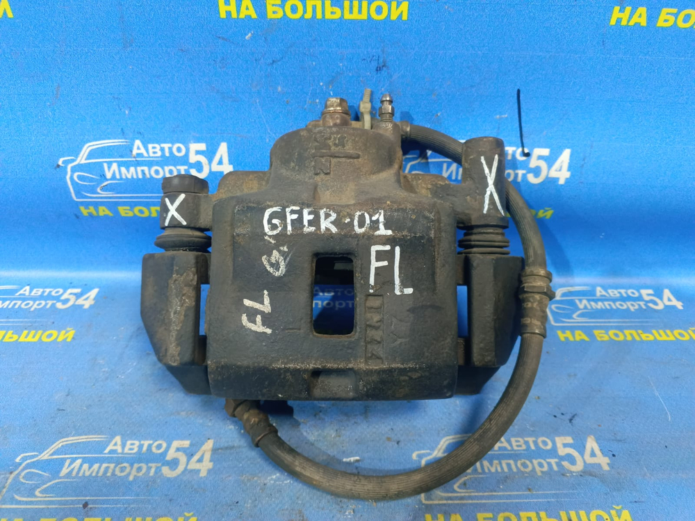 Суппорт тормозной передний левый MAZDA CAPELLA 1998