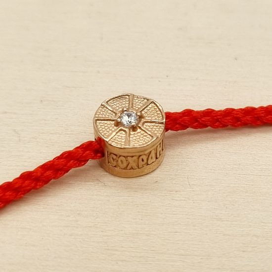 Красный браслет с позолоченным тапочком Спиридона и бусиной