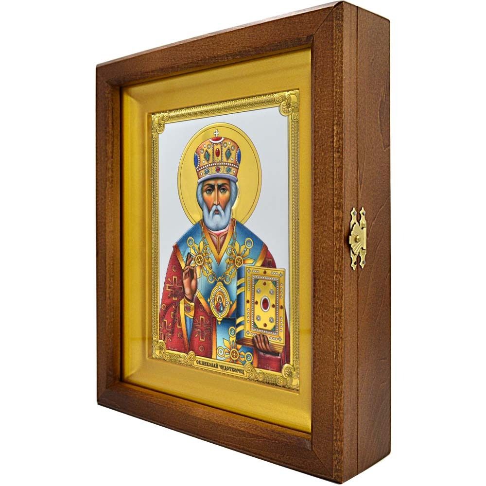 Николай Чудотворец Угодник Божий. Икона в серебряном окладе, в деревянном киоте.
