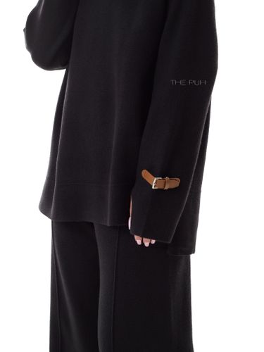 Черный трикотажный костюм с брюками