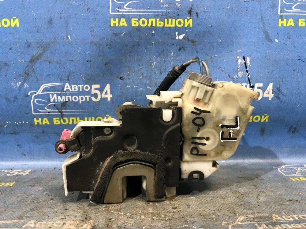 Замок двери передней левой NISSAN PRIMERA 1999