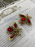 Накладка на пуговицу золотистая бронза "Жук" с красными стразами