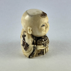 Статуэтка нэцкэ Мальчик Карако с корзиной цветов