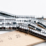 Гематит Рондель 6 граней бусины (имитация), цвет серебристый, размер около 2*5,5 мм, цена за отрезок 19 см (1/2 нити)