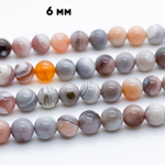 Агат Ботсвана розовый, диаметр 6-6,1 мм, цена за 31-32 шт (1/2 нити)