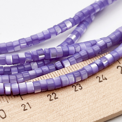 Перламутр тонированный, цвет фиолетовый, размер 4*2,5 мм, цена за отрезок 19 см (1/2 нити)