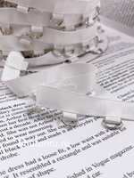 Тесьма белая с серебристыми полукольцами корсетная