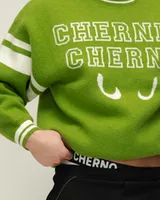 Зеленый свитер 