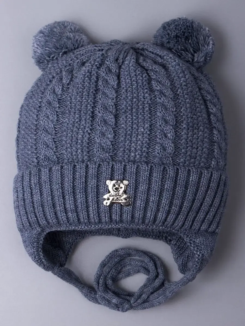 Шапка детская вязаная демисезонная на завязках