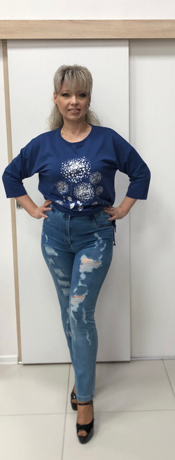 Стрейчевые "рваные" джинсы синего цвета зауженные к низу