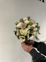 Свадебный букет из ранункулюсов, анемонов, брунии и одноголовых роз