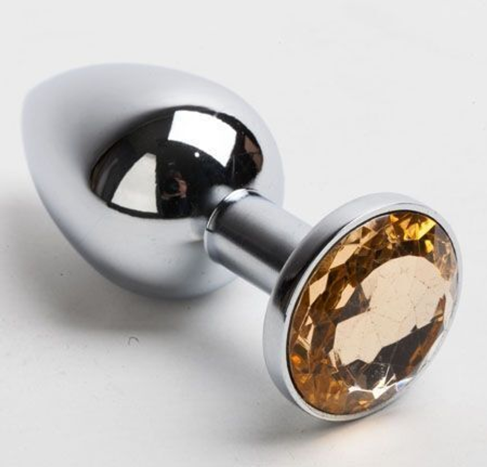 Серебристая анальная пробка с желтым кристаллом - 8,2 см. (Цвет: желтый)