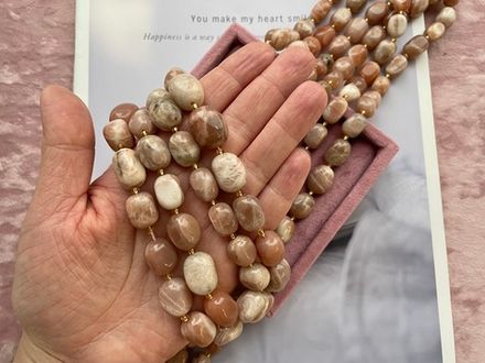 Нить бусин из солнечного камня 12-17мм (галтовка)