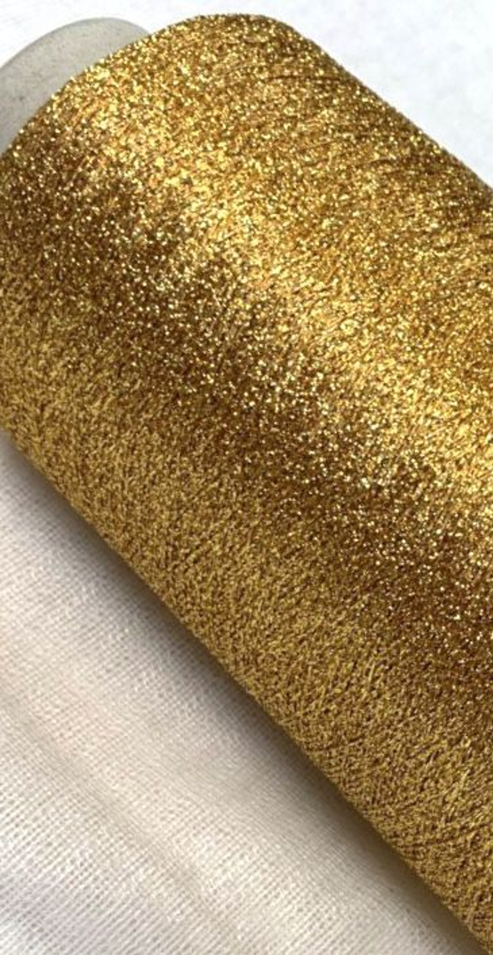 Пряжа на бобине (Италия) Нить люрекс 100г-2100 м 64% вискоза 36% п/э 325 г