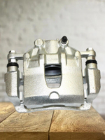 Суппорт тормозной передний левый 581801RA00 для Solaris, Rio