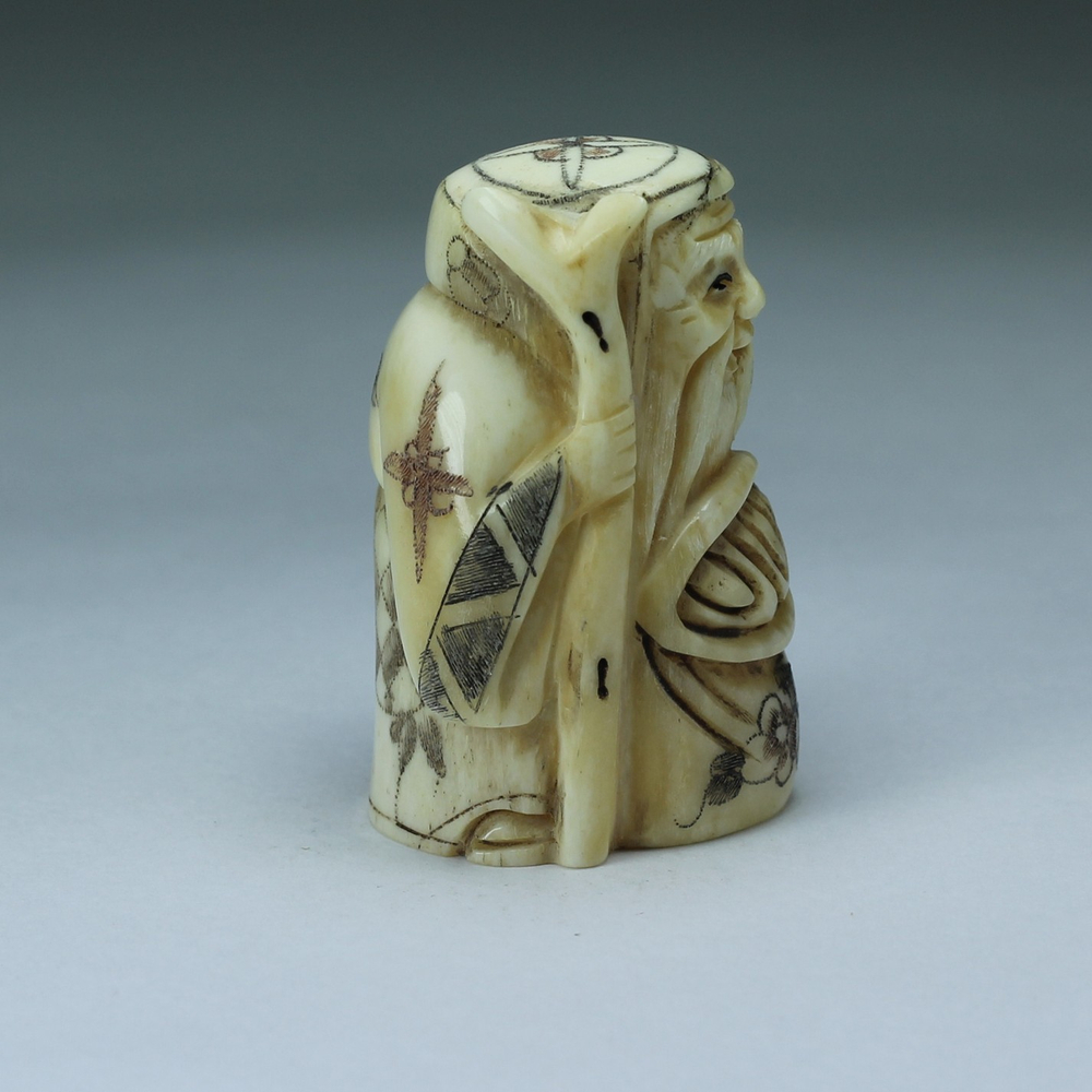 Нэцкэ Фукурокудзю с мешком и посохом