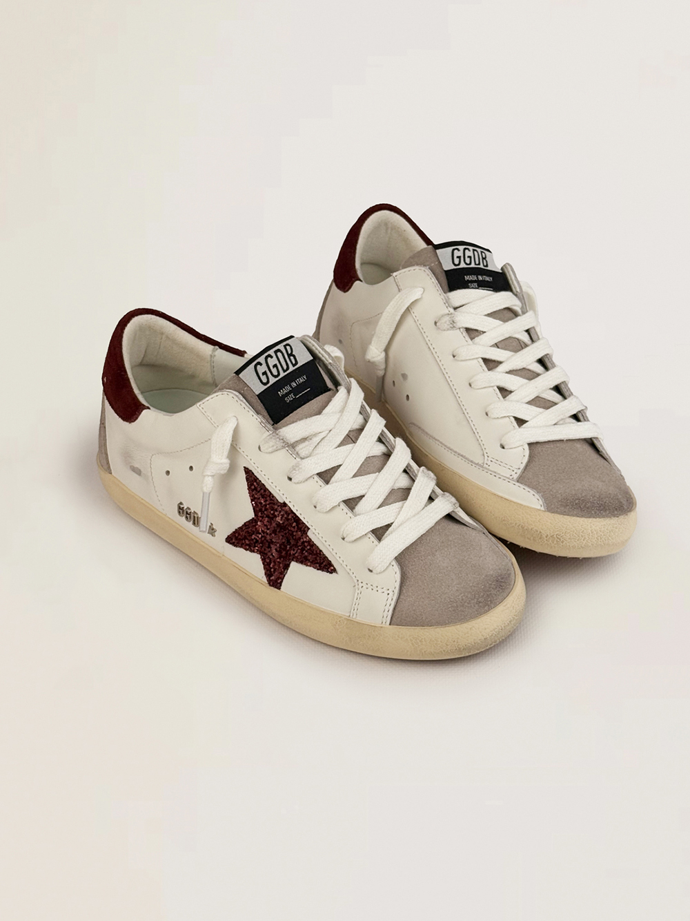 Super Star with burgundy glitter star and burgundy heel tab