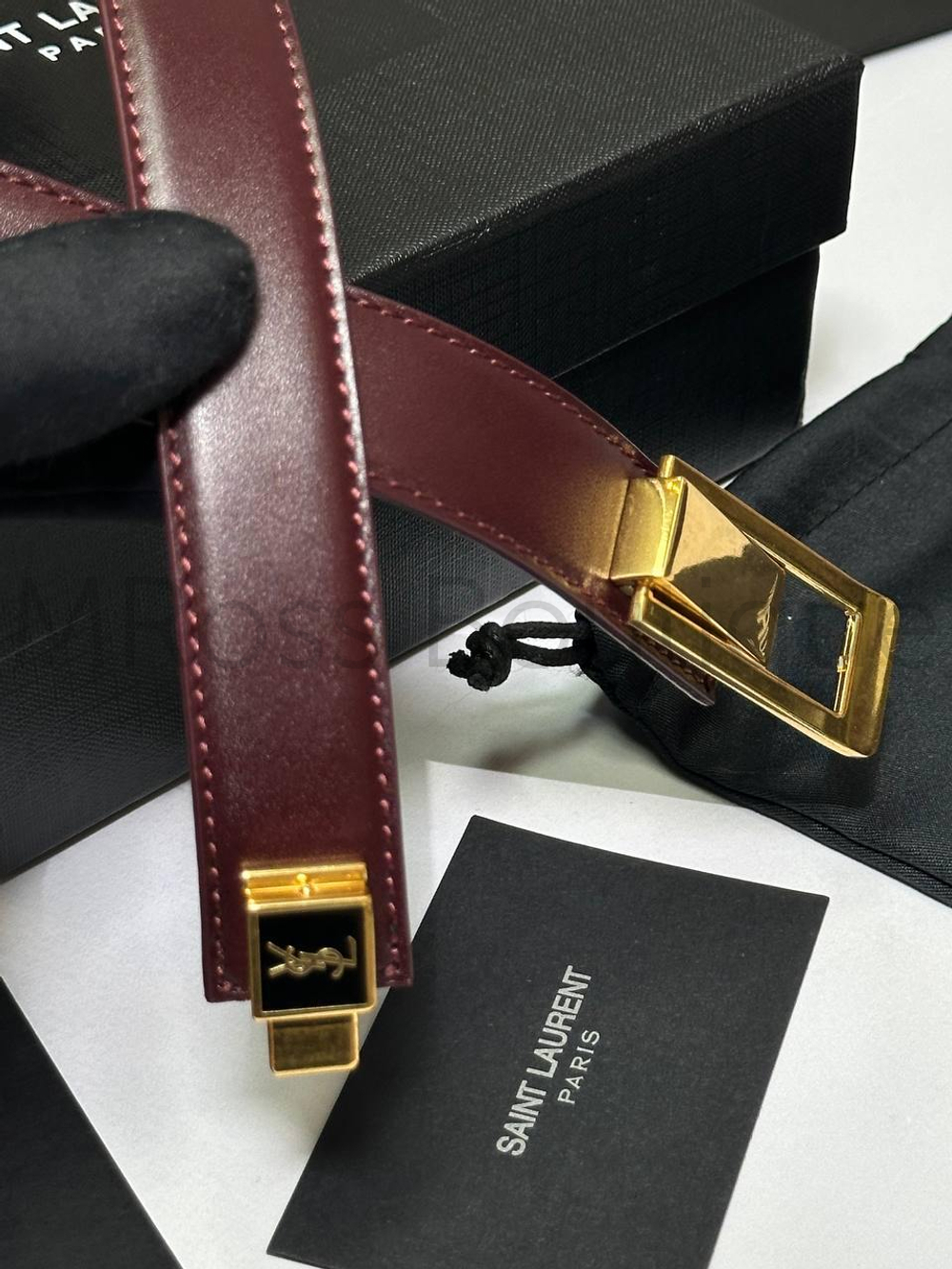 Ремень Yves Saint Laurent женский бордовый из кожи