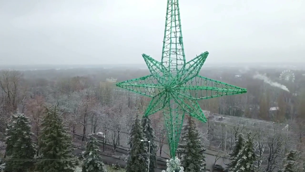 световая макушка на елку "Роза ветров" зеленая