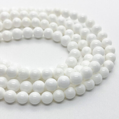 Арагонит бусины, диаметр около 6,4-6,6 мм, цена за 27-28 шт (1/2 нити)