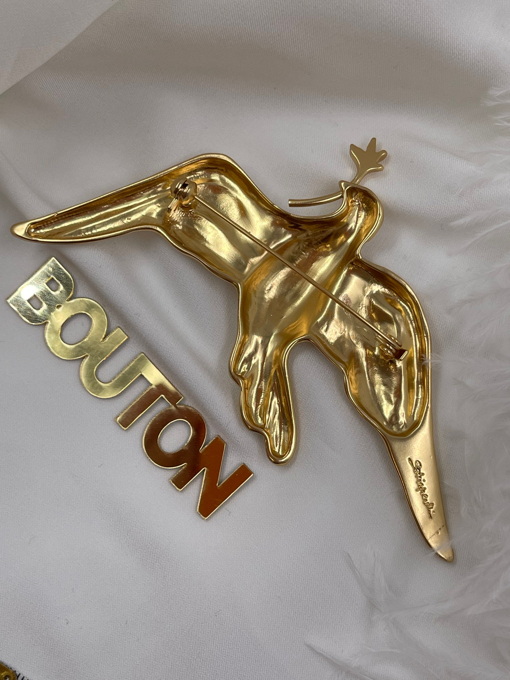 Брошь Скиап. ласточка в золоте