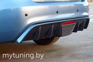 Диффузор заднего бампера со стопом для Kia Rio III
