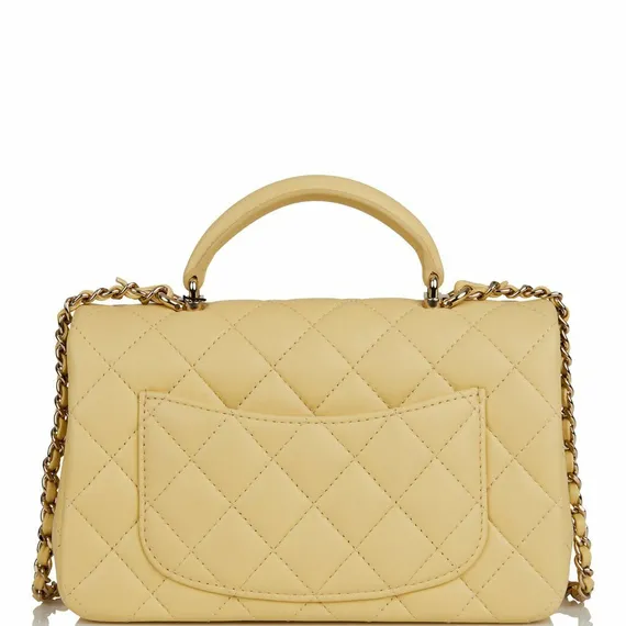 Стеганая мини-сумка Chanel с ручкой