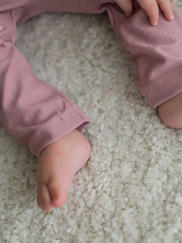 Брюки из джинскота с рюшей 