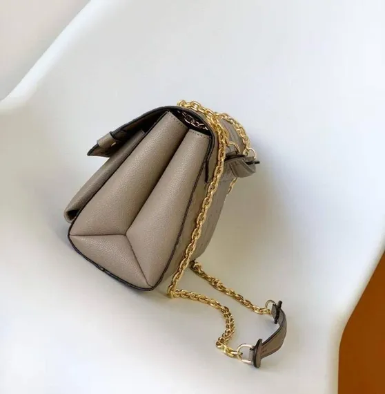 Сумка Louis Vuitton Vavin PM бежевый