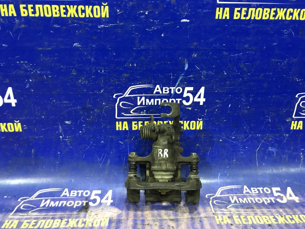 Суппорт тормозной задний правый NISSAN PRIMERA 1997