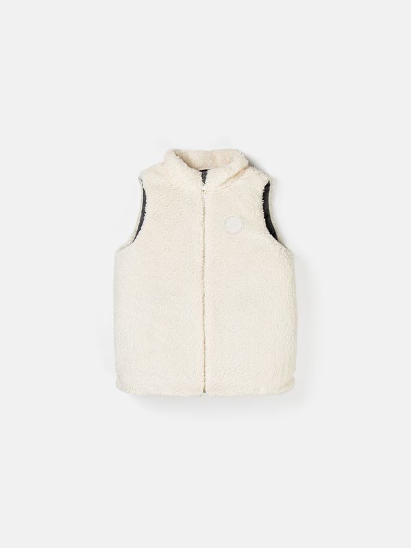 Жилет стеганый на молнии двухсторонний 